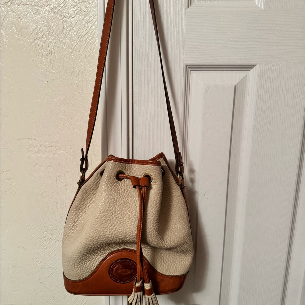 Dooney and Bourke Chic Tan and Cream Leather Bucket Shoulder Bag